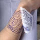 Illustration for article titled Camera Tattood in Time Lapse (by Another Camera)